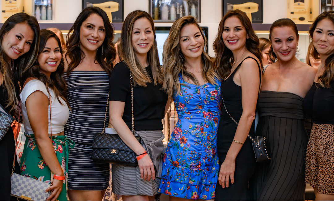 Group of eight ladies at Girls' Night Out shopping event in 2019